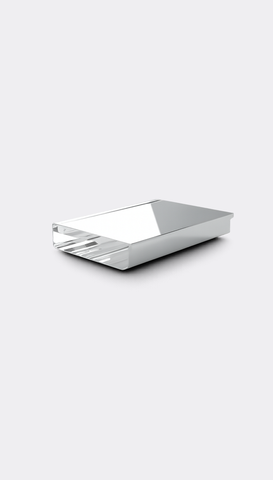 A silver metallic desk organizer box with a reflective, polished finish, shown at an angle on a light gray background.