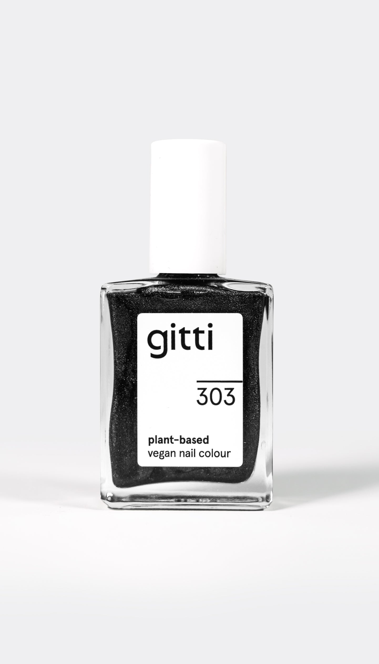 A bottle of gitti brand nail polish in a metallic black color, labeled as 'no. 303 A Muse Me Black'.