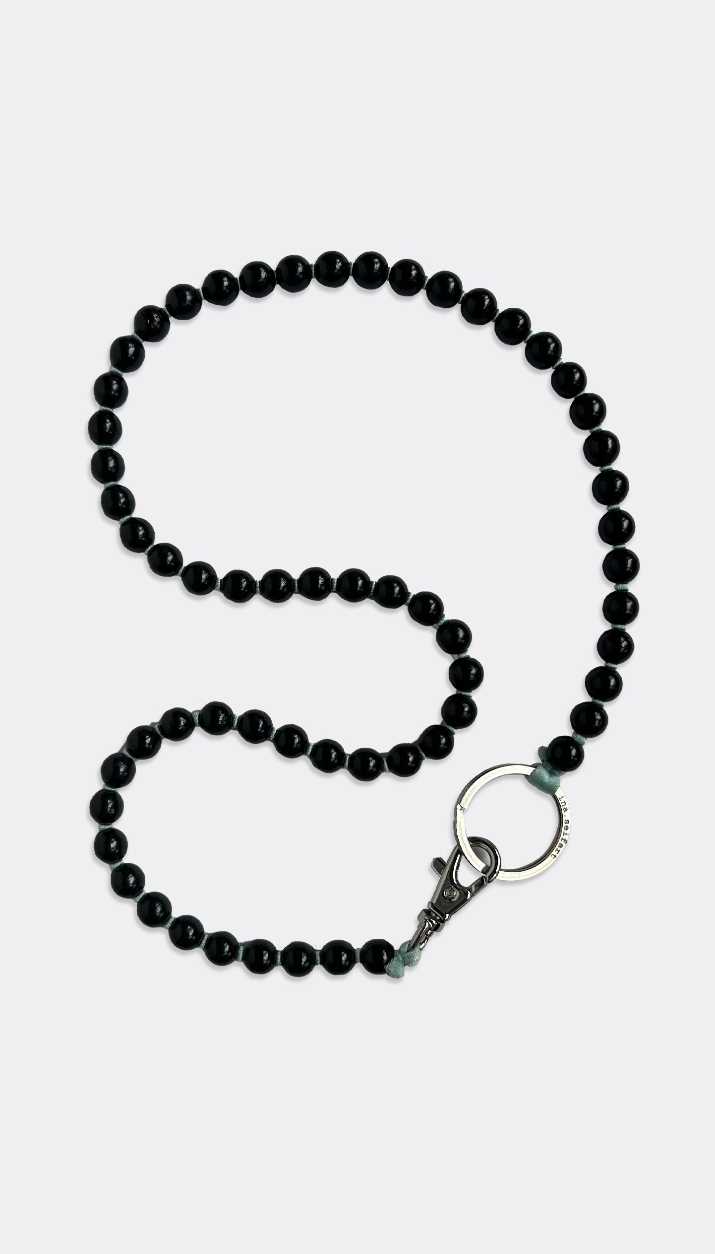 Black keychain by Ina Seifart