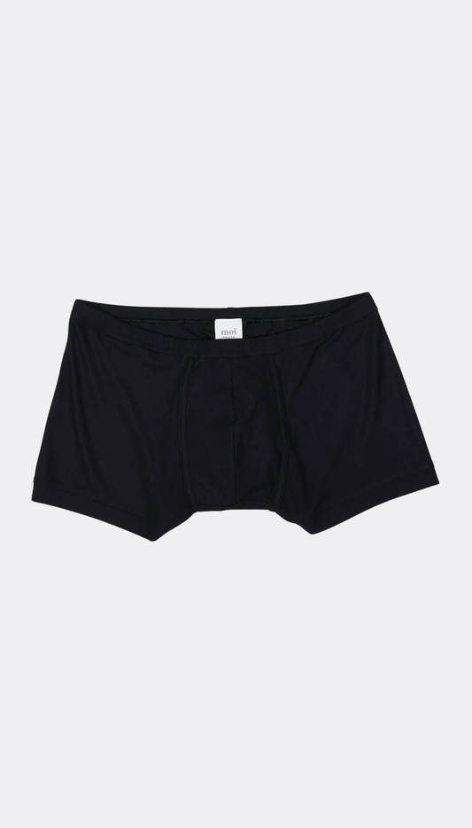 Black boxer briefs on a white background