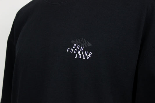Black t-shirt with white slanted text 'Bon Fucking Jour' on a plain background