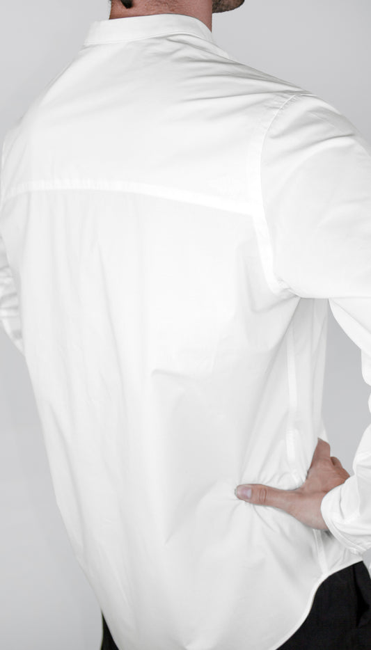 Person wearing a white Le Mao shirt with long sleeves on a plain background