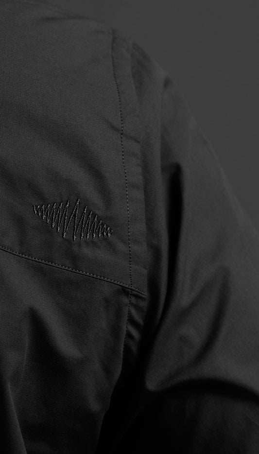 SUPERMARQUE logo on Le OJ shirt