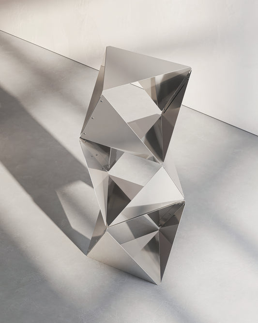 Multiple Anobjct Crystal side tables stacked on top of each other