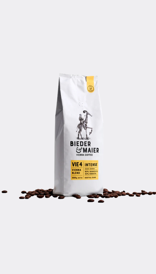 Bieder & Maier coffee bag with coffee beans on a white background