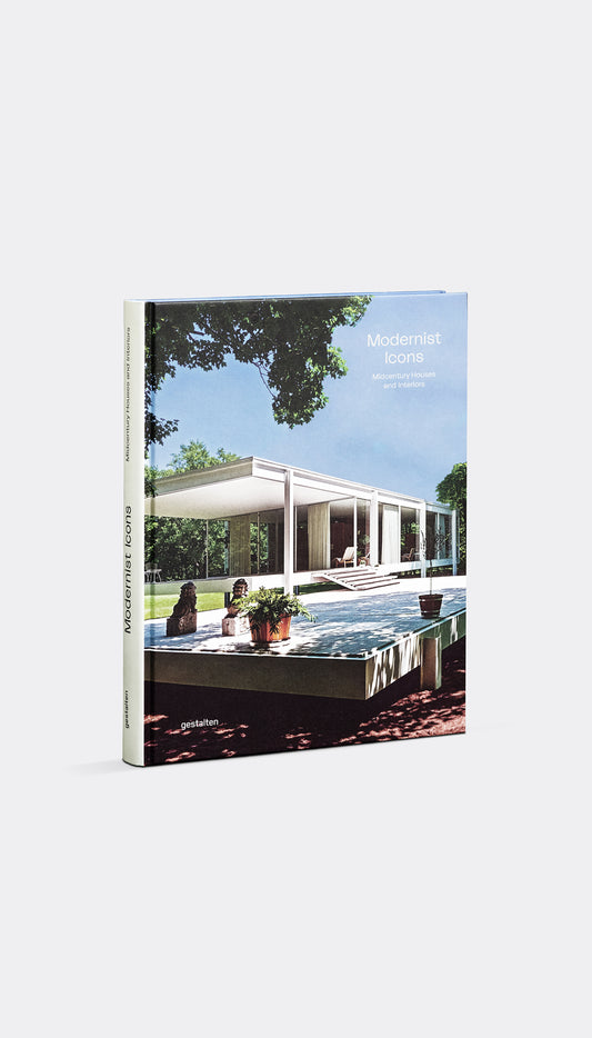 Modernist Icon book cover featuring a modern house with a pool and trees in the background.
