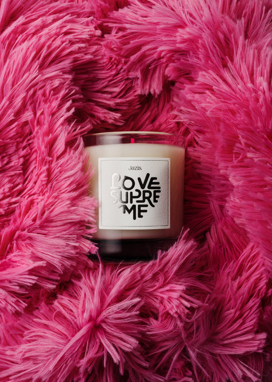 Jazis Love Supreme Candle on a pink fluffy surface