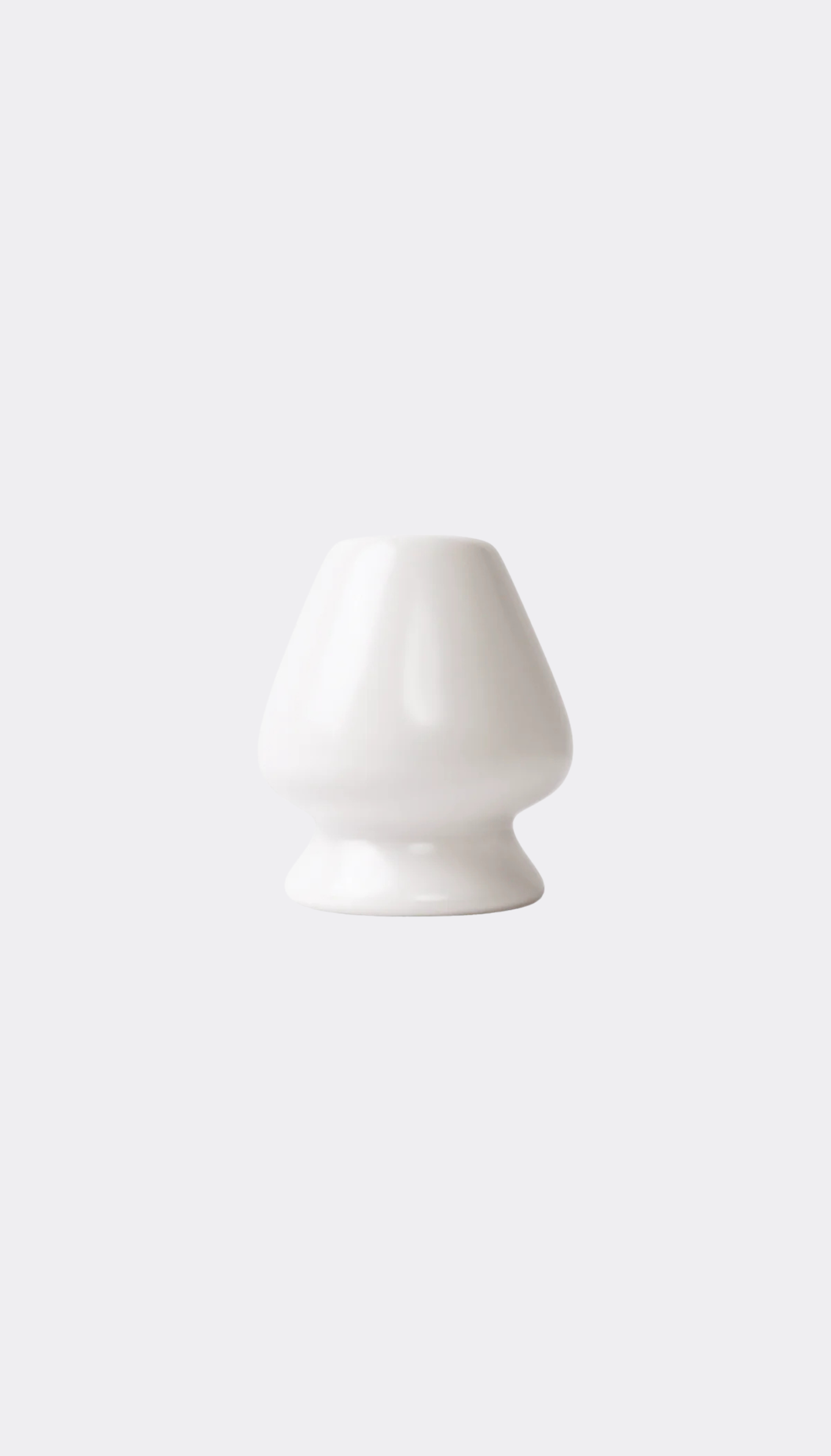White ceramic vase on a white background