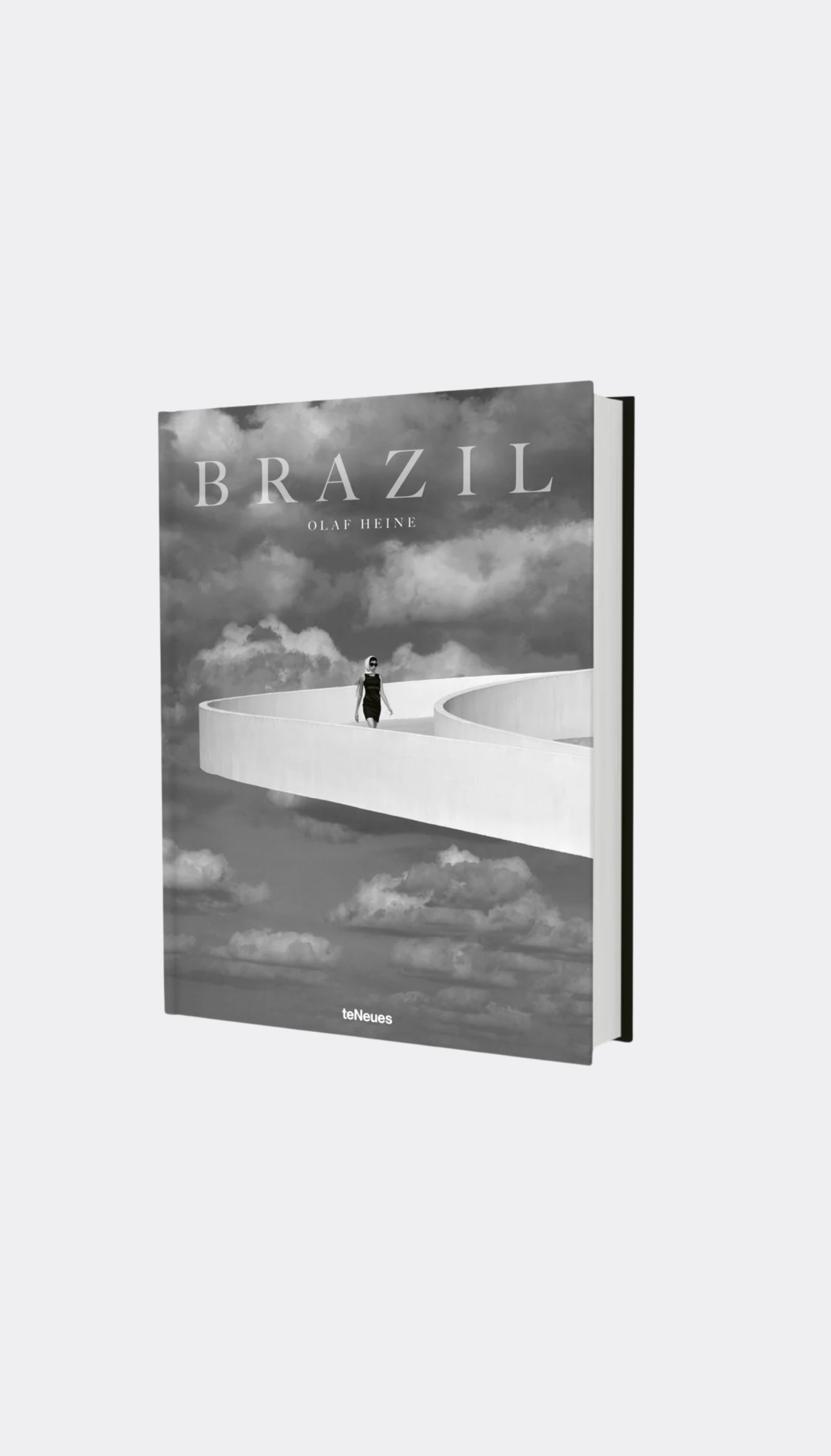Book titled 'Brazil' with a cover featuring a minimalist landscape design on a white background by photographer Olaf Heine