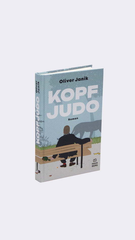 Book titled 'Kopf Judo' by Oliver Janik on a light gray background