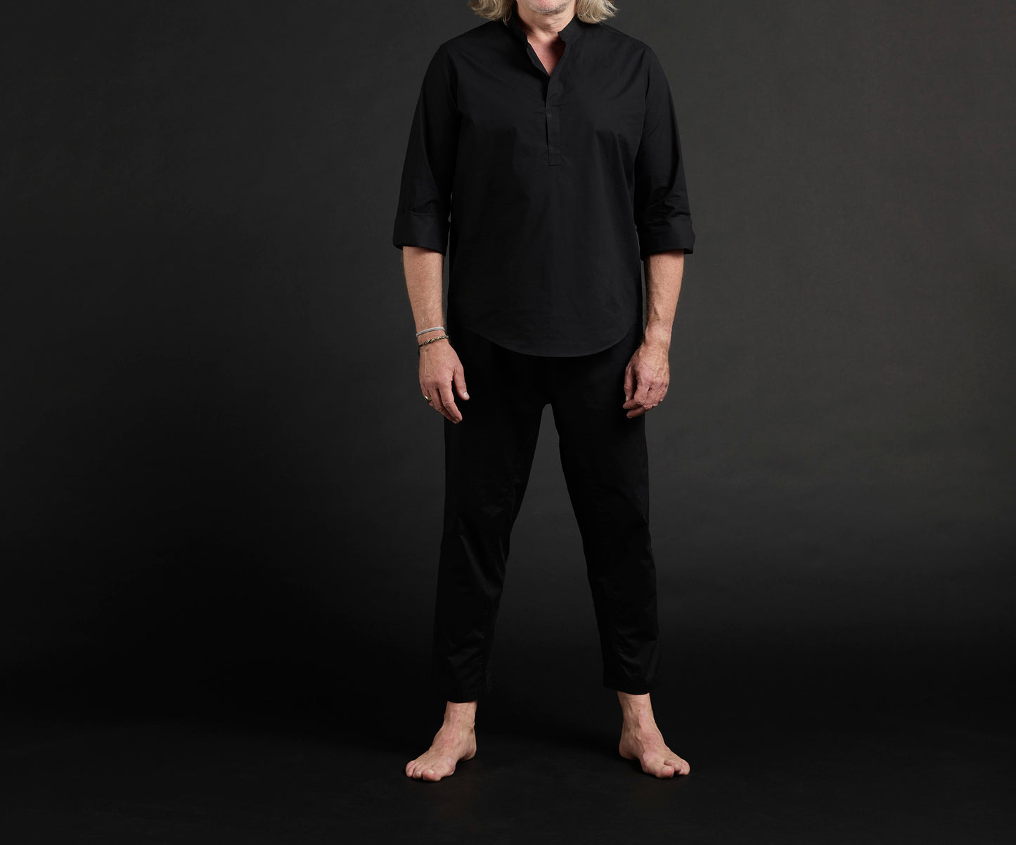 Front worn shot of the Outama shirt and Pants in black