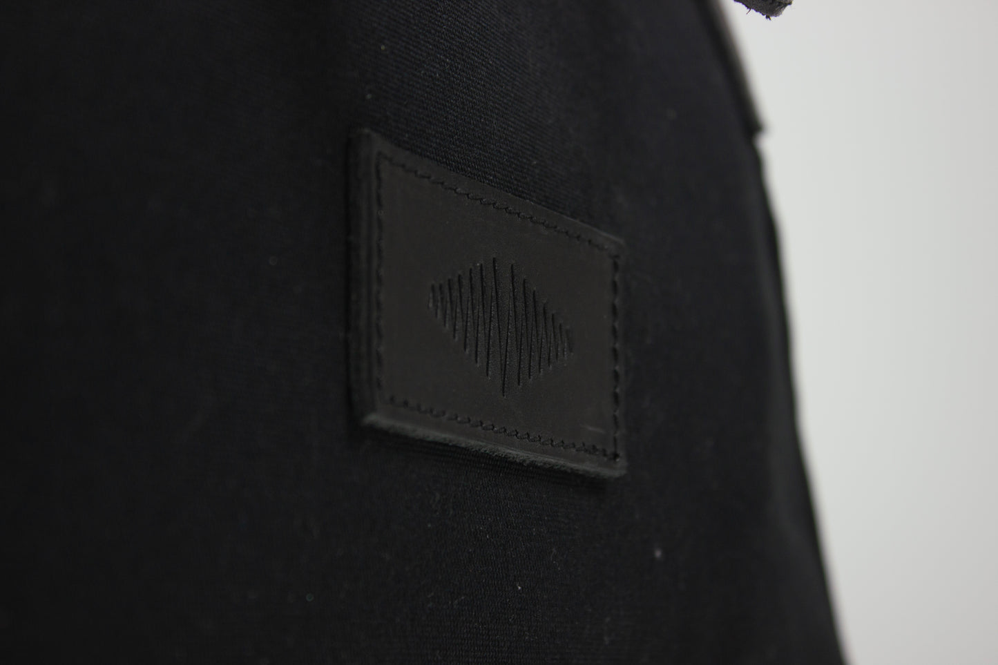 Logo on black SUPERMARQUE everyday weekender bag